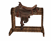 cowboy saddle and stand