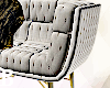 B) Tufted Accent Chair