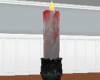 Tall blood candle