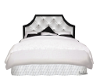 white bed with poses