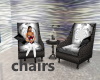 silvery S cage chairs