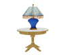 Gold table w/blue lamp