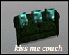 couple kiss couch