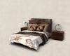 Brown bed w/merle covers