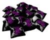 purple rose pillow pile