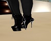 spiked black boots