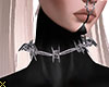 X. Barbed choker