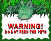 DO NOT FEED THE PET sign