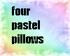 four pastel pillows