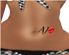 AJ Lip Stomach Tattoo
