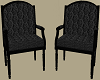 Patterned black chairs