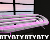 B} Pink Oval Couch