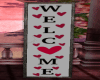 VAL e WELCOME SIGN