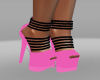 pink shoe. blk straps