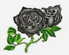 Black rose belly tattoo