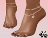 Red pedicure with rings