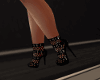 Buckled heals black