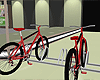 Red Bikes on a Rack