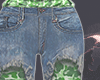 Green ripped shorts