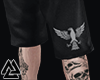 Black shorts + tattoo