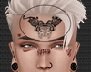 Tat. Face Maori